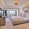 Installed Lighting Cove Molding for Indirect Lighting creating soft perimeter ceiling illumination in a contemporary bedroom.