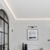 Installed New York 2-Step Crown Molding for LED's creating soft perimeter ceiling illumination in a refined contemporary interior.