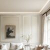 Installed Miami Art Deco 2-Step Crown Molding for LED's creating soft perimeter ceiling illumination in an elegant contemporary living room.