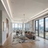 New York 2-Way / 3-Step Molding for Indirect Lighting illuminating a contemporary living room ceiling