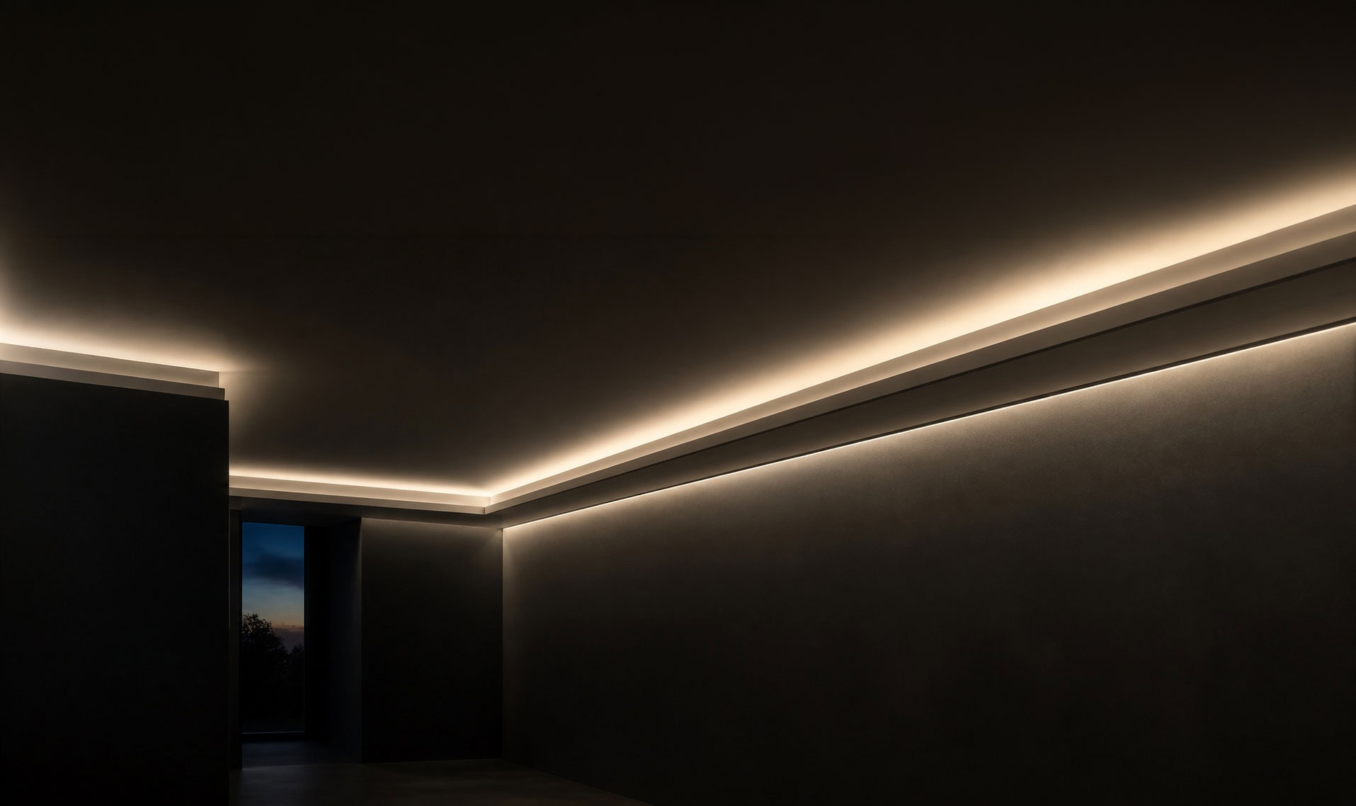 About Us – LED Crown Molding Interior with warm indirect ceiling and wall lighting in a dark modern room